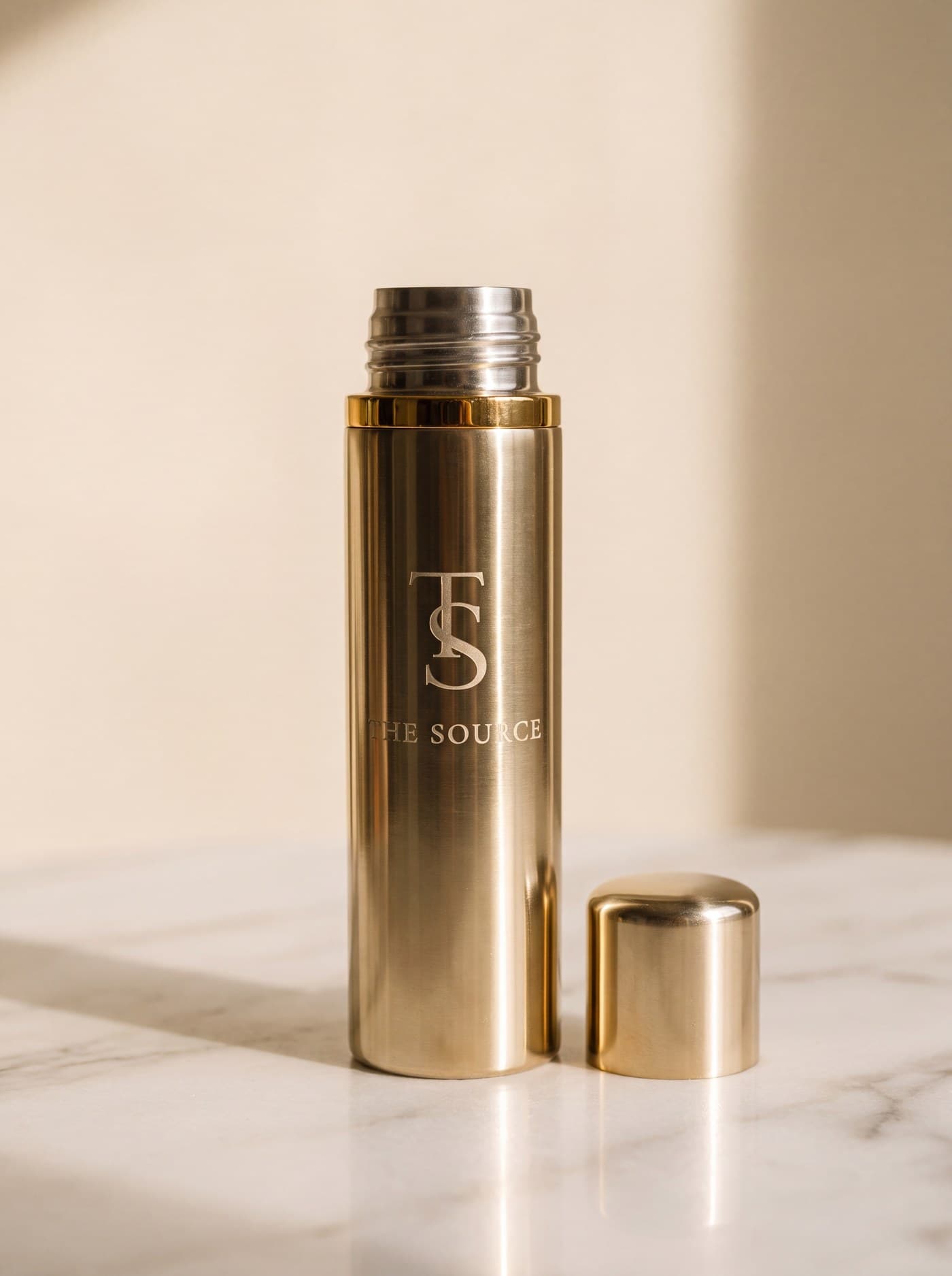 Engraved gold travel vessel